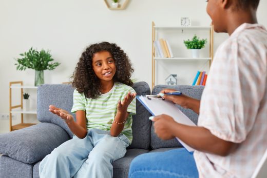 Psychiatrist talking to child
